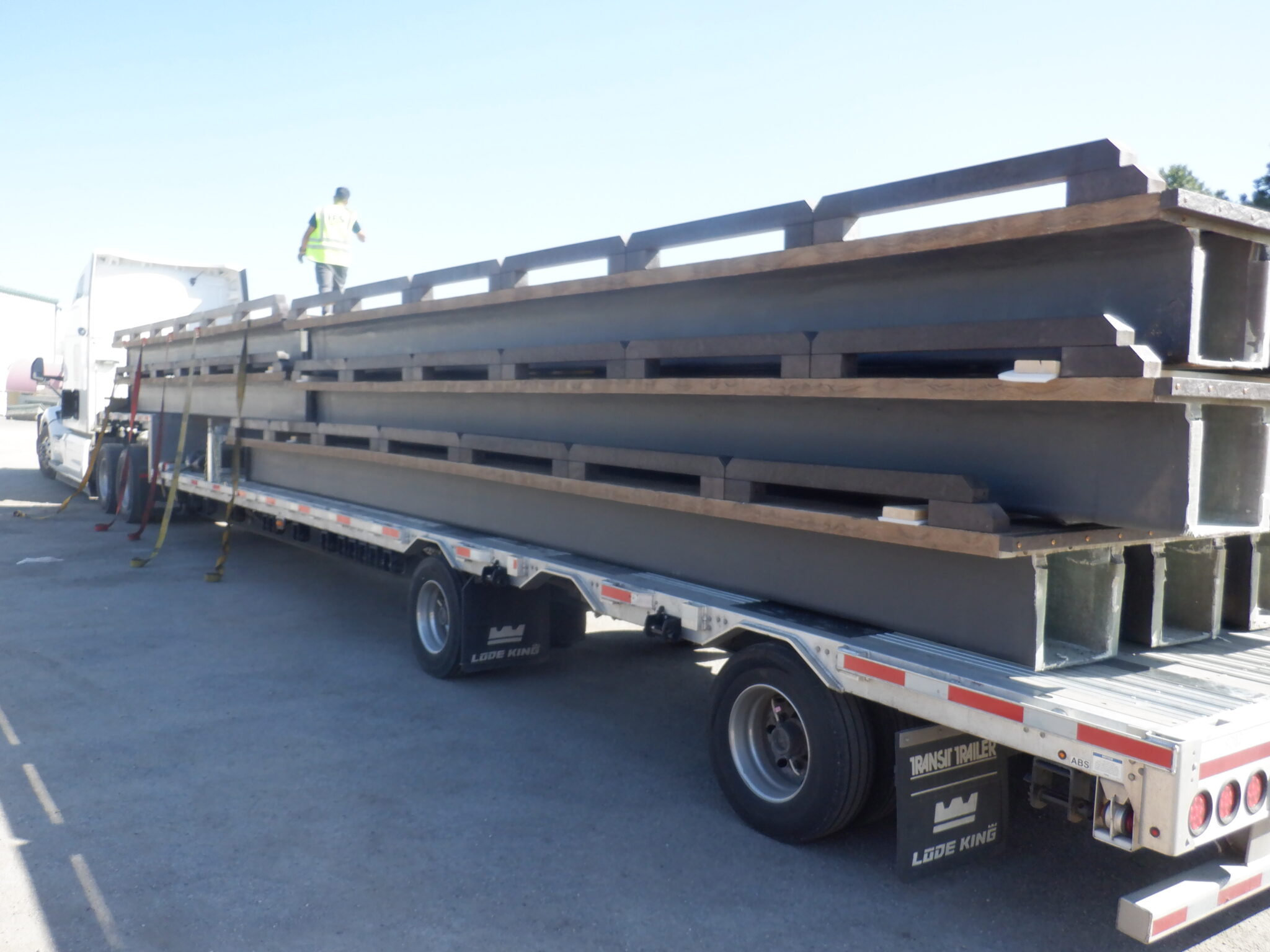 Delivery truck arriving in May 2025 with the first five Links Bridges for Tributer Resort.